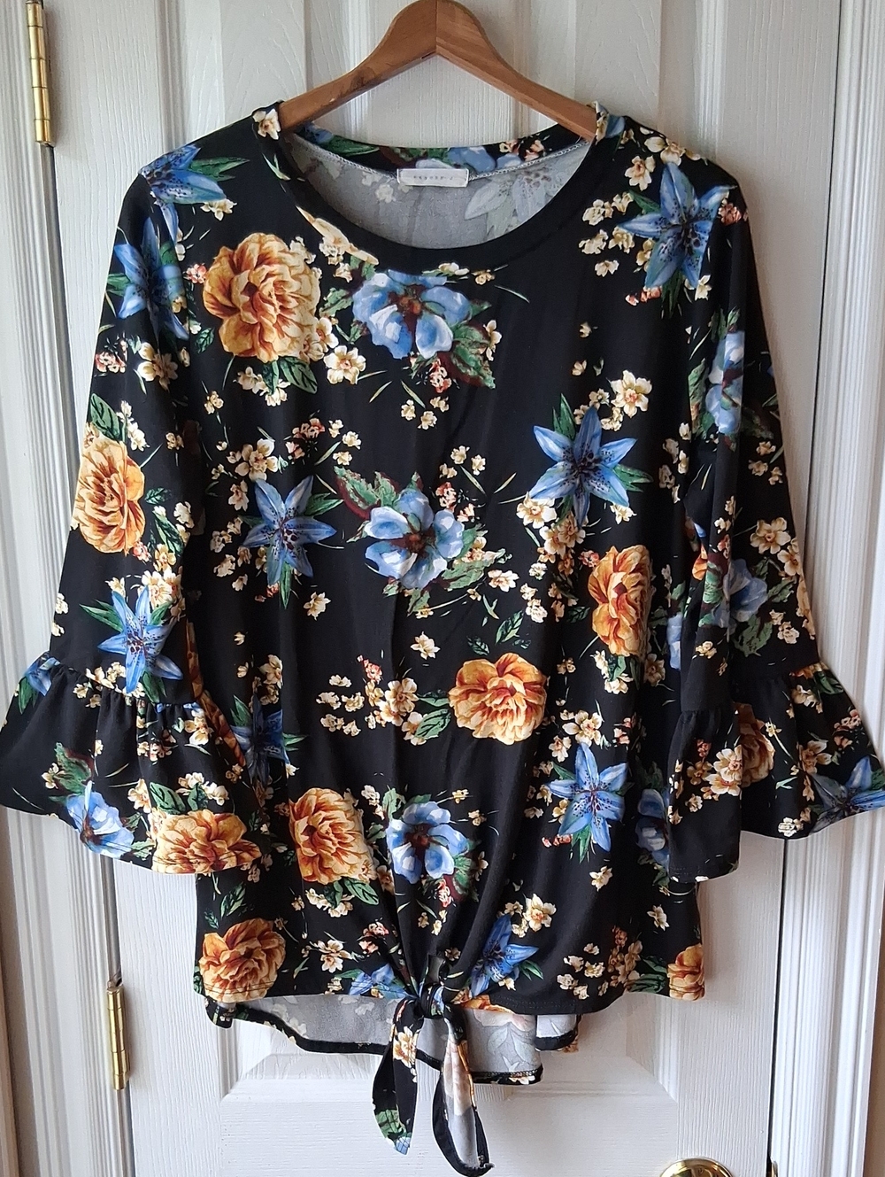 Reborn J Floral Black Blouse With Bell Sleeves And Front Tie Tunic Length